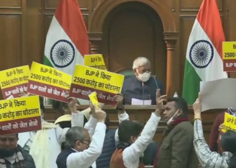 Aam Aadmi Party MLAs wave banner of alleged BJP scam in Vidhan Sabha, read news