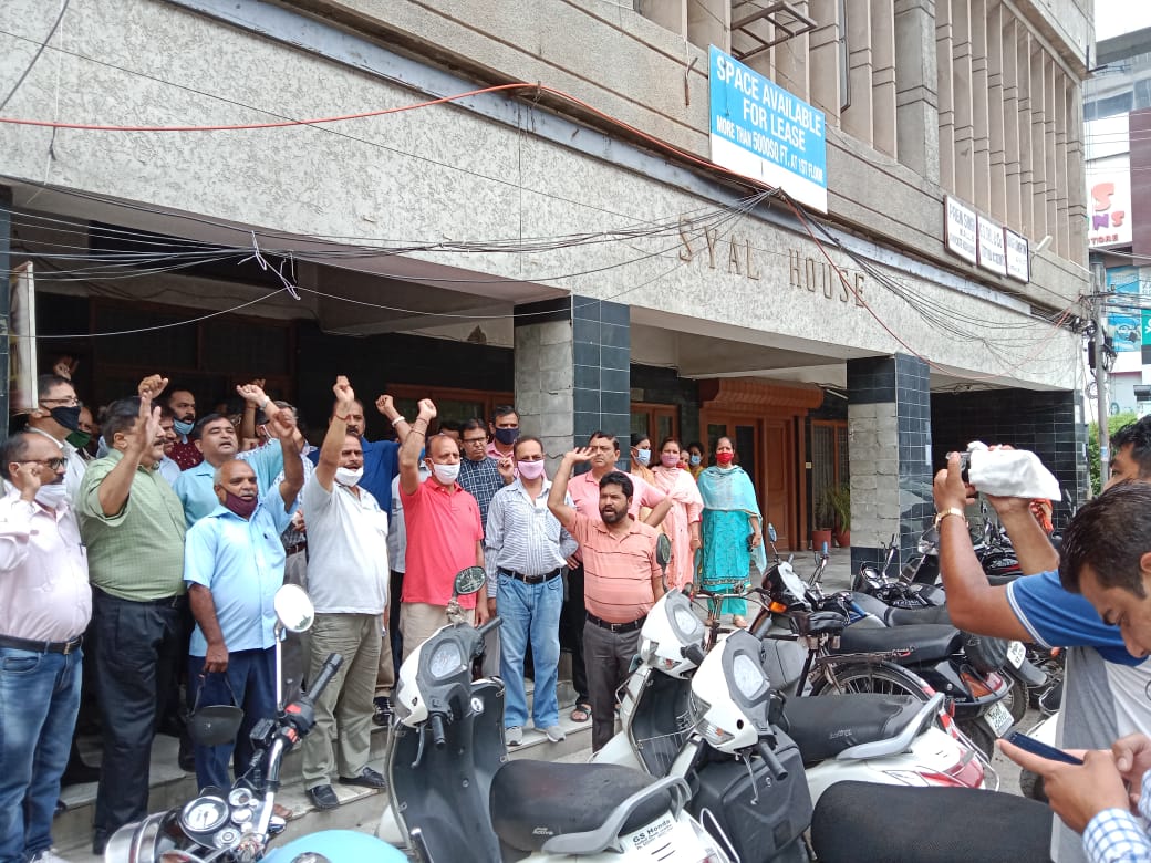 Insurance employees protest outside United India Insurance against the proposal for privatization of public sector general insurance companies