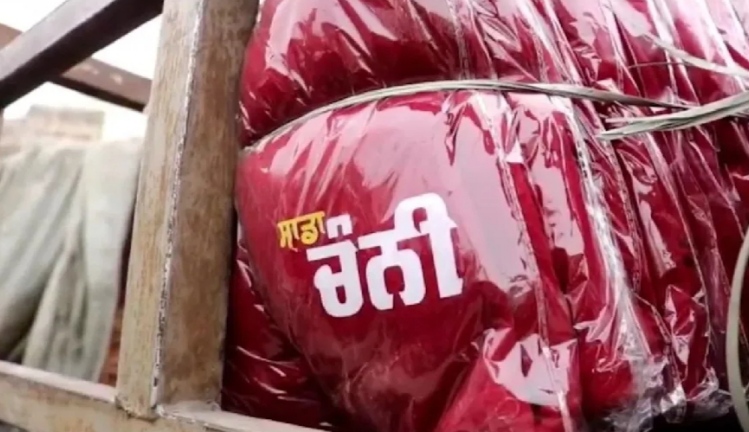 AAP workers created a ruckus after two trucks loaded with track suits written 'Sadda Channi' were caught in Model Town of Jalandhar.