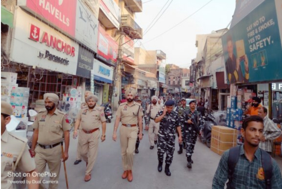 Flag march taken out under ACP North Damanbir Singh