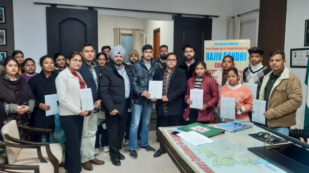 Deputy Commissioner distributed certificates to 18 students who did one year computer course.