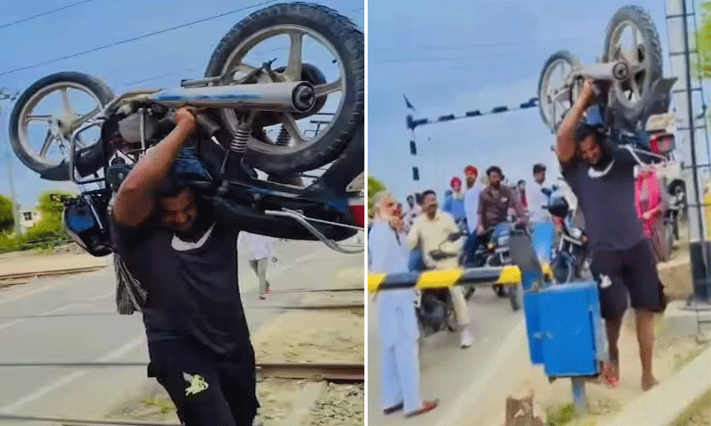 रेलवे फाटक था बंद तो शख्स ने बाइक कंधे पर उठाकर पार की रेलवे क्रॉसिंग, दंग रह गए लोग